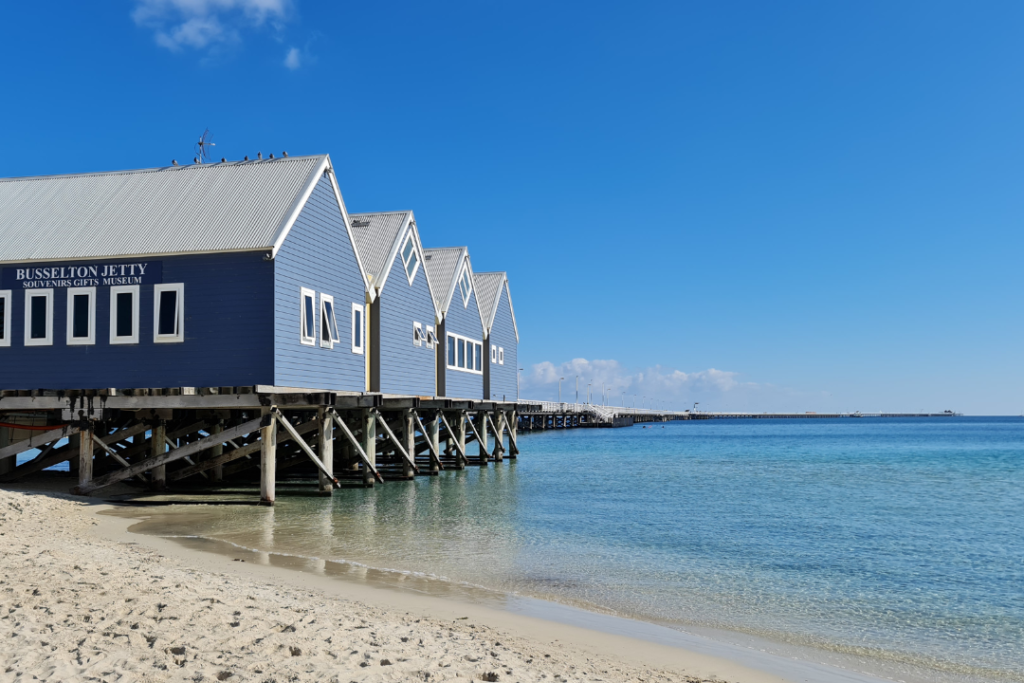 Busselton Jetty Interpretive Centre, a blue and white building at the shore end of Busselton Jetty. 